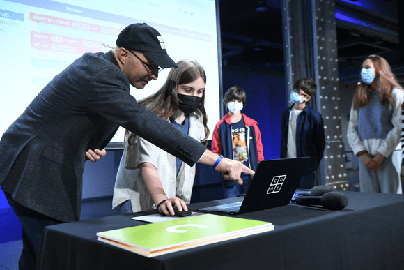 CEO Hadi Partovi and a student at a computer